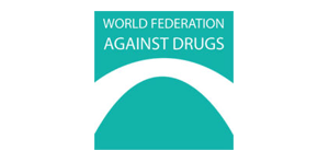 World Federation Against Drugs logo image: the logo is made up of an aqua-green squared background, and a white stylized white bridge that resembles an irregular semicircle. The name of the organization is located on top of it in a slim sans-serif font.